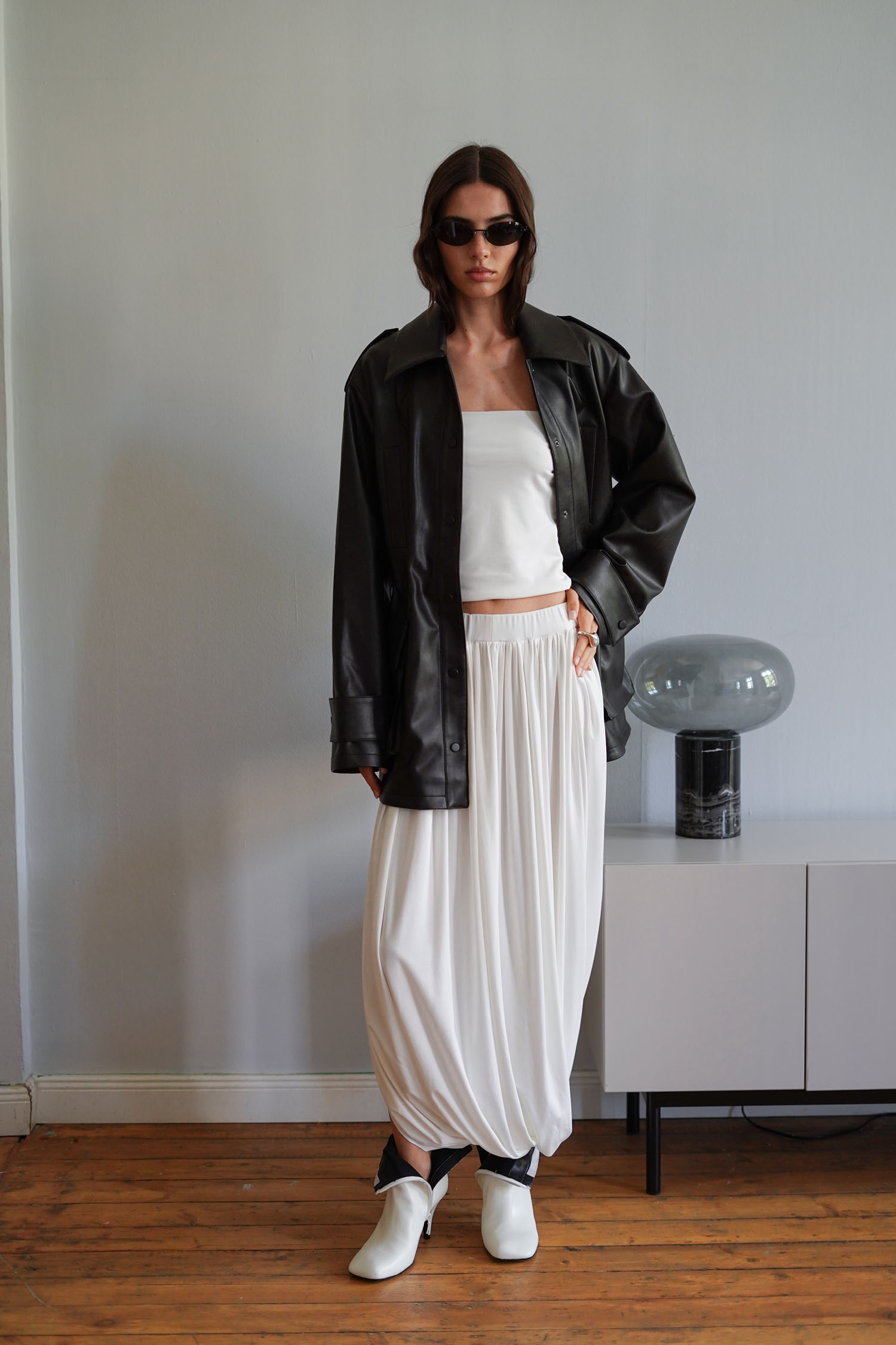 Трикотажна спідниця міді зі складами молочна TLA_00003396, фото 1 Трикотажна спідниця міді зі складами молочна TLA_00003396, фото 1 - в интернет магазине KAPSULA